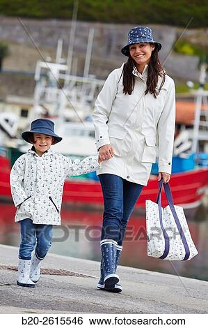 Mother and daughter in the fishing port. Getaria. Gipuzkoa. Basque Country. Spain View Large Photo Image Stock Photograph - Mother and daughter in the fishing port. Getaria. Gipuzkoa. Basque Country. Spain. Fotosearch