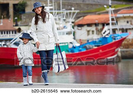 Mother and daughter in the fishing port. Getaria. Gipuzkoa. Basque Country. Spain View Large Photo Image Stock Photography - Mother and daughter in the fishing port. Getaria. Gipuzkoa. Basque Country. Spain. Fotosearch