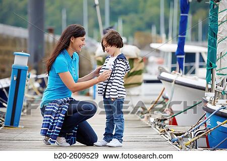 Mother and daughter in the marina. Port. Getaria. Gipuzkoa. Basque Country. Spain View Large Photo Image Stock Photo - Mother and daughter in the marina. Port. Getaria. Gipuzkoa. Basque Country. Spain. Fotosearch