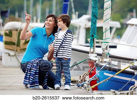 Mother and daughter in the marina. Port. Getaria. Gipuzkoa. Basque Country. Spain View Large Photo Image Stock Photo - Mother and daughter in the marina. Port. Getaria. Gipuzkoa. Basque Country. Spain. Fotosearch