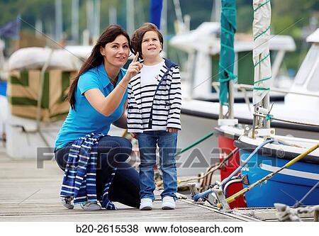 Mother and daughter in the marina. Port. Getaria. Gipuzkoa. Basque Country. Spain View Large Photo Image Stock Photo - Mother and daughter in the marina. Port. Getaria. Gipuzkoa. Basque Country. Spain. Fotosearch