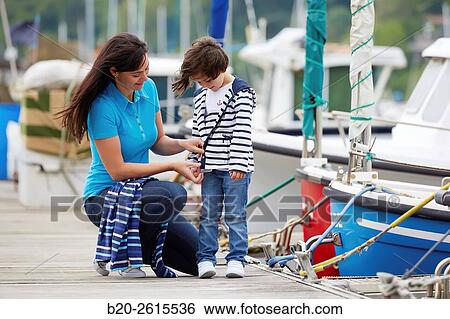 Mother and daughter in the marina. Port. Getaria. Gipuzkoa. Basque Country. Spain View Large Photo Image Stock Photograph - Mother and daughter in the marina. Port. Getaria. Gipuzkoa. Basque Country. Spain. Fotosearch