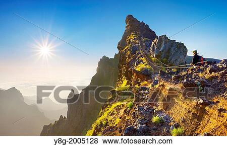 Mountain hiking trail from Pico do Aeeiro to Pico Ruivo, Madeira, Portugal. View Large Photo Image Stock Photo - Mountain hiking trail from Pico do Aeeiro to Pico Ruivo, Madeira, Portugal.. Fotosearch