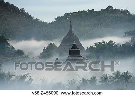 Myanmar, Rakhine State, Mrauk U, Dukkanthein and Ratanabon pagodas at sunrise. View Large Photo Image Stock Image - Myanmar, Rakhine State, Mrauk U, Dukkanthein and Ratanabon pagodas at sunrise.. Fotosearch