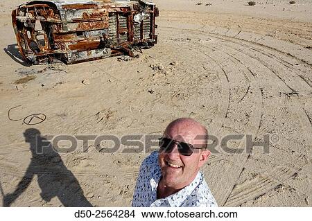 NAMIB DESERT, NAMIBIA Car wreck and selfie. View Large Photo Image Picture - NAMIB DESERT, NAMIBIA Car wreck and selfie.. Fotosearch