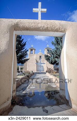 Stock Image - New Mexico, USA - Adobe church, Rancho de Taos NM.. Fotosearch