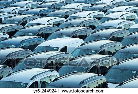 Stock Image - New vehicles on dockside in Santa Cruz port on Tenerife, Canary Islands, Spain.. Fotosearch