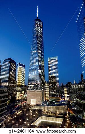 Picture - New York City, NY NYC, Manhattan, Lower, Financial District, One World Trade Center, centre, high rise, skyscraper, building, National September 11 Memorial & Museum, 911 9/11, plaza, pools, night,. Fotosearch