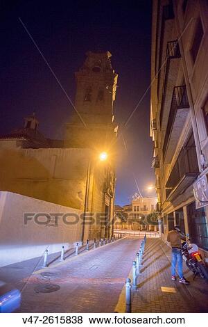 Night photography street Virgen de Belens old town Almansa, in the background the Church of the Assumption, Almansa, Albacete, Castilla La Mancha, Spain View Large Photo Image Stock Photo - Night photography street Virgen de Belens old town Almansa, in the background the Church of the Assumption, Almansa, Albacete, Castilla La Mancha, Spain. Fotosearch