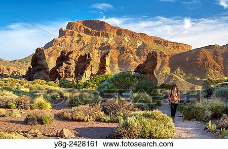 Stock Image - Nordic walking in Teide National Park, Tenerife, Canary Islands, Spain.. Fotosearch