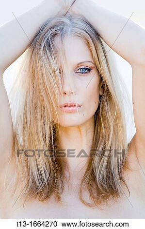 Stock Image - One eye woman portrait. Fotosearch