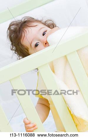 One year old baby shy View Large Photo Image Stock Photo - One year old baby shy. Fotosearch