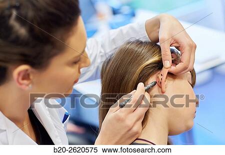 Otoplasty. winged ears. Malformation there is an absence antehelix crease. Otoplasty involves molding the ear cartilage to create a new fold. Doctor attending to patient medical consultation. Office. Plastic surgery. Pediatrician. View Large Photo Image Stock Photography - Otoplasty. winged ears. Malformation there is an absence antehelix crease. Otoplasty involves molding the ear cartilage to create a new fold. Doctor attending to patient medical consultation. Office. Plastic surgery. Pediatrician.. Fotosearch