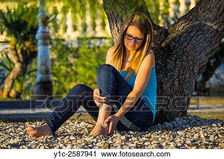 Painful ankle teen girl View Large Photo Image Stock Image - Painful ankle teen girl. Fotosearch