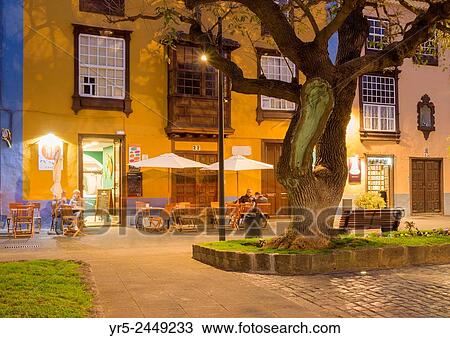 People at street cafe at dusk in La Laguna, Tenerife, Canary Islands, Spain. View Large Photo Image Stock Image - People at street cafe at dusk in La Laguna, Tenerife, Canary Islands, Spain.. Fotosearch