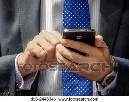 Stock Photography - People talking with a cell phone.. Fotosearch