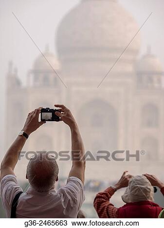 Person photographing Taj Mahal using mobile camera, Agra, Uttar Pradesh, India. View Large Photo Image Stock Image - Person photographing Taj Mahal using mobile camera, Agra, Uttar Pradesh, India.. Fotosearch