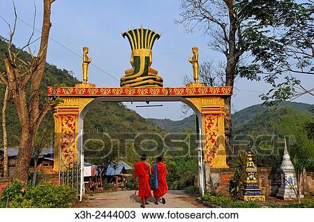 Pha Chiao Sing Kham temple's gate at Muang La, Oudomxay Province in northwestern Laos, Southeast Asia. View Large Photo Image Stock Image - Pha Chiao Sing Kham temple's gate at Muang La, Oudomxay Province in northwestern Laos, Southeast Asia.. Fotosearch