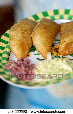 Stock Image - Pie-empanada ready to serve in a restaurant in Palenque town, Palenque, Chiapas State, Mexico, North America.. Fotosearch