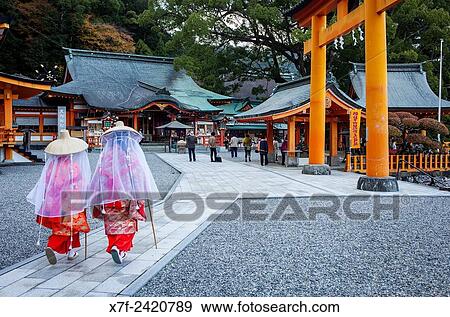 Stock Photo - Pilgrims in Kumano Nachi Taisha Grand Shire, Kumano Kodo, Nakahechi route, Wakayama, Kinki, Japan.. Fotosearch