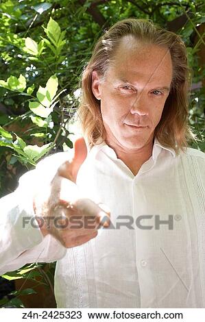 Pointing man. Coyoacan, Mexico City. View Large Photo Image Stock Image - Pointing man. Coyoacan, Mexico City.. Fotosearch