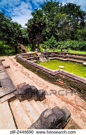 Polonnaruwa Ancient City, tourists at the Bathing Pool (Kumara Pokuna) of Parakramabahu's Royal Palace, Sri Lanka, Asia. View Large Photo Image Stock Image - Polonnaruwa Ancient City, tourists at the Bathing Pool (Kumara Pokuna) of Parakramabahu's Royal Palace, Sri Lanka, Asia.. Fotosearch