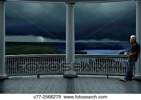 porch, lightning, storm, man. coffee View Large Photo Image Stock Photo - porch, lightning, storm, man. coffee. Fotosearch