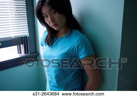 Picture - portrait of a beautiful young asian girl from canada.. Fotosearch