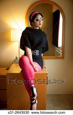 Stock Image - portrait of a beautiful young asian girl from Canada.. Fotosearch