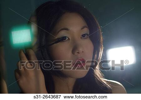 Stock Photo - portrait of a beautiful young asian girl from canada.. Fotosearch