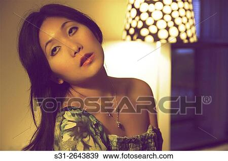Stock Photo - portrait of a beautiful young asian girl from canada.. Fotosearch