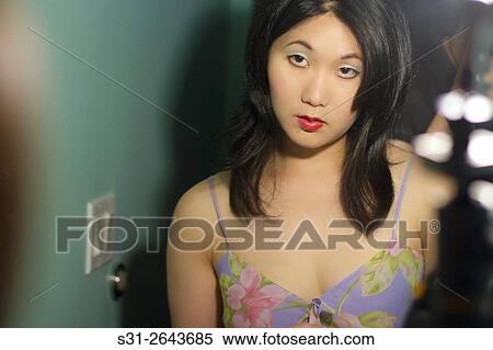 Stock Photography - portrait of a beautiful young asian girl from canada.. Fotosearch