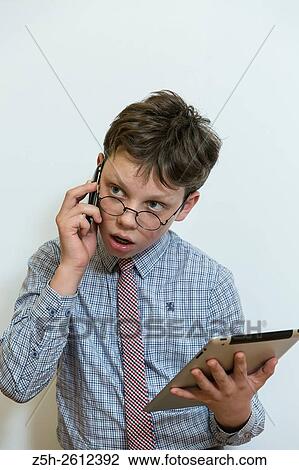 Stock Image - Portrait of a middle school student on a dedicated white background.. Fotosearch