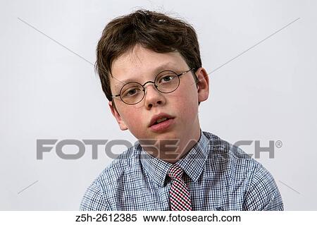 Stock Photography - Portrait of a middle school student on a dedicated white background.. Fotosearch