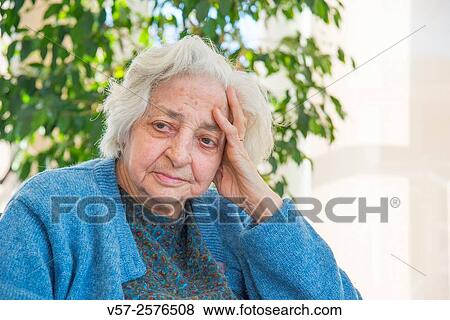 Portrait of old woman in a nursing home. View Large Photo Image Stock Photo - Portrait of old woman in a nursing home.. Fotosearch