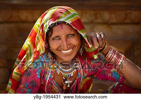 Stock Image - Portrait of smiling indian woman, Jaisalmer, Rajasthan State, India.. Fotosearch