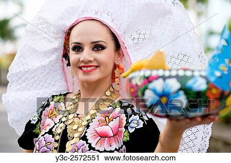 Portrait of young woman smiling. Puerto Vallarta, Jalisco, Mexico. Xiutla Dancers - a folkloristic Mexican dance group in traditional costumes representing the culture and different regions of Mexico. View Large Photo Image Stock Image - Portrait of young woman smiling. Puerto Vallarta, Jalisco, Mexico. Xiutla Dancers - a folkloristic Mexican dance group in traditional costumes representing the culture and different regions of Mexico.. Fotosearch