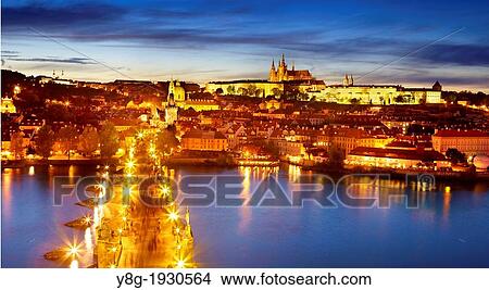 Picture - Prague, Hradcany - Old Town, view at Charles Bridge, Vitus Cathedral and the Castle District by night, Prague, Czech Republic. Fotosearch