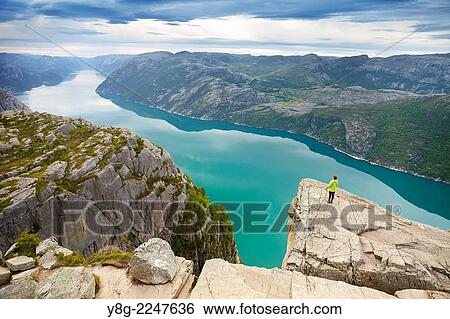 Preikestolen with view at Lysefjorden, Norway. View Large Photo Image Stock Photograph - Preikestolen with view at Lysefjorden, Norway.. Fotosearch
