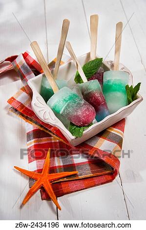 Presentation icicles formed of different colors and different flavors. View Large Photo Image Stock Photograph - Presentation icicles formed of different colors and different flavors.. Fotosearch