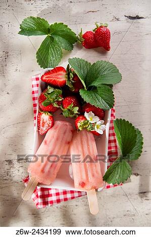 Presentation of a cream made of fruit on the plate strawberry. View Large Photo Image Stock Photo - Presentation of a cream made of fruit on the plate strawberry.. Fotosearch