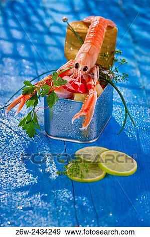 Presentation of a crustacean with mixed vegetables in box. View Large Photo Image Stock Photo - Presentation of a crustacean with mixed vegetables in box.. Fotosearch