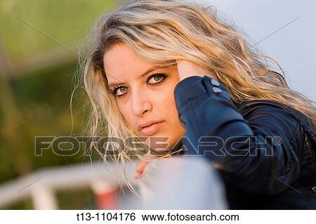 Pretty blonde portrait in sunset light View Large Photo Image Stock Photograph - Pretty blonde portrait in sunset light. Fotosearch