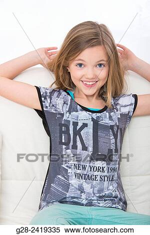 pretty little girl expressing happiness and surprise View Large Photo Image Stock Photography - pretty little girl expressing happiness and surprise. Fotosearch