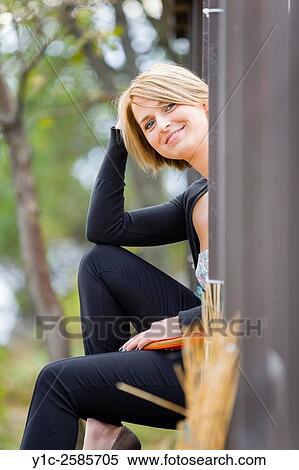 Pretty woman behind corner is happy View Large Photo Image Stock Photography - Pretty woman behind corner is happy. Fotosearch