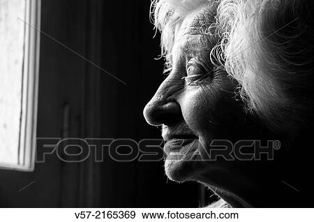 Profile portrait of an elderly woman smiling. Black and White. View Large Photo Image Stock Photo - Profile portrait of an elderly woman smiling. Black and White.. Fotosearch