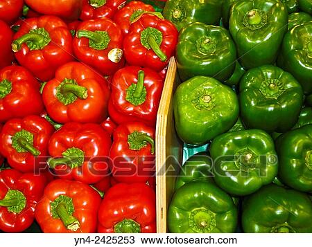 Stock Image - Red and green bell peppers.. Fotosearch