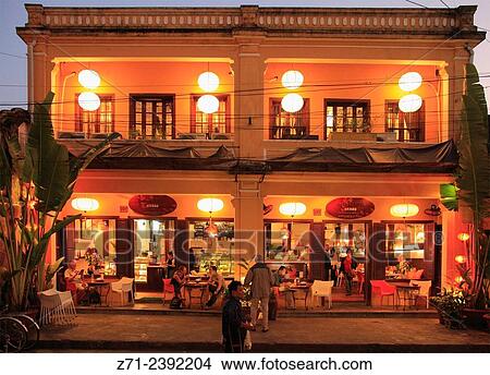 Restaurant, street scene, people, Hoy An, Vietnam View Large Photo Image Picture - Restaurant, street scene, people, Hoy An, Vietnam. Fotosearch