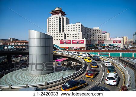roundabout with traffic at central station in beijing china View Large Photo Image Stock Image - roundabout with traffic at central station in beijing china. Fotosearch
