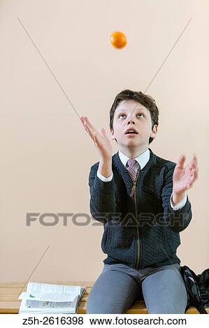 Russia. Belgorod region. Village Solomino. The boy twelve years preparing for school. View Large Photo Image Stock Photo - Russia. Belgorod region. Village Solomino. The boy twelve years preparing for school.. Fotosearch